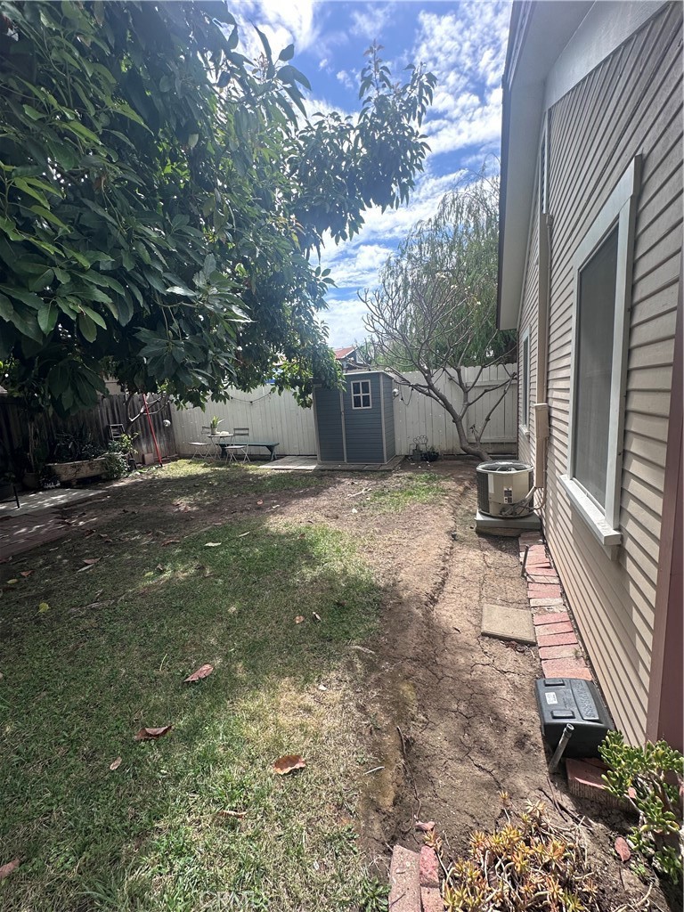 243 North Grand Street, Unit 1/2 Orange, CA 92866 - Photo 8 of 29 a view of a couches with wooden fence