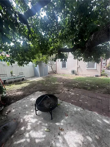 a kitchen with white cabinets and a stainless steel appliances
