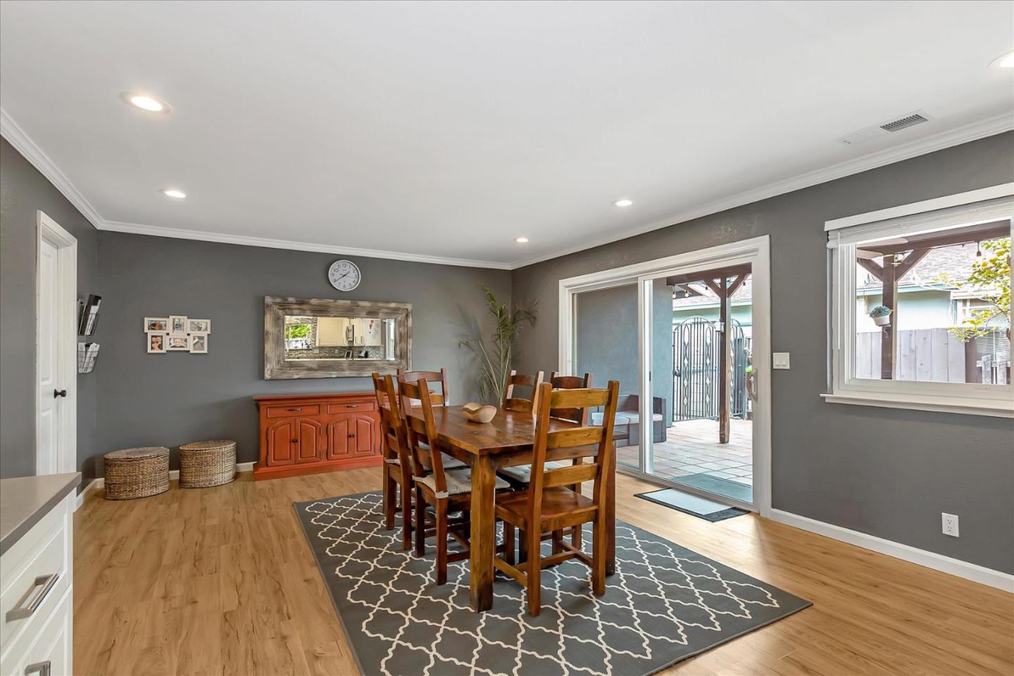 637 Escuela Place Milpitas, CA 95035 - Photo 19 of 49 a view of a dining room with furniture window and wooden floor