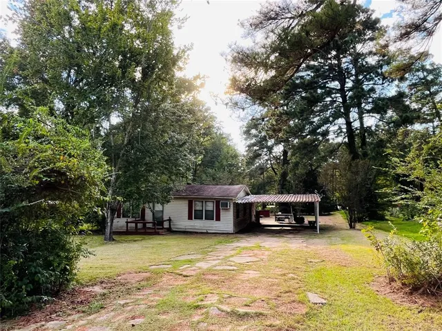 a view of a house with a swimming pool