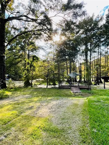 a view of kitchen and dining room with furniture