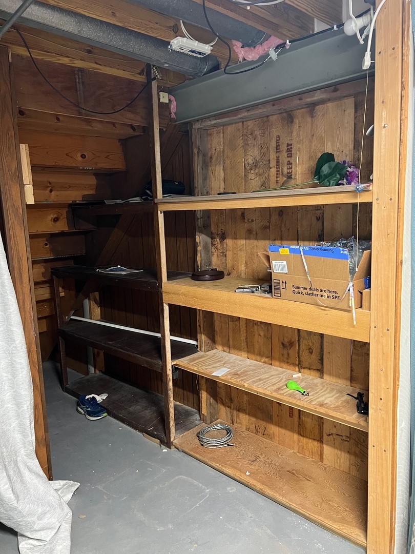 641 Surfside Point, Unit 641 Schaumburg, IL 60194 - Photo 18 of 18 a room with wooden shelves