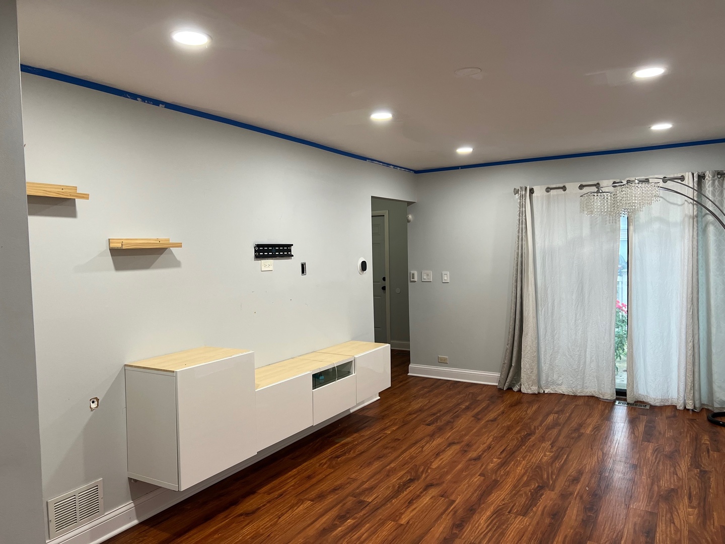 641 Surfside Point, Unit 641 Schaumburg, IL 60194 - Photo 7 of 18 a view of a livingroom with wooden floor