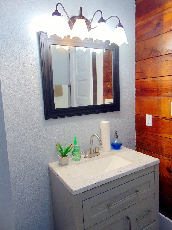 3420 Avenue R Galveston, TX 77550 - Photo 18 of 36 a bathroom with a sink and a mirror