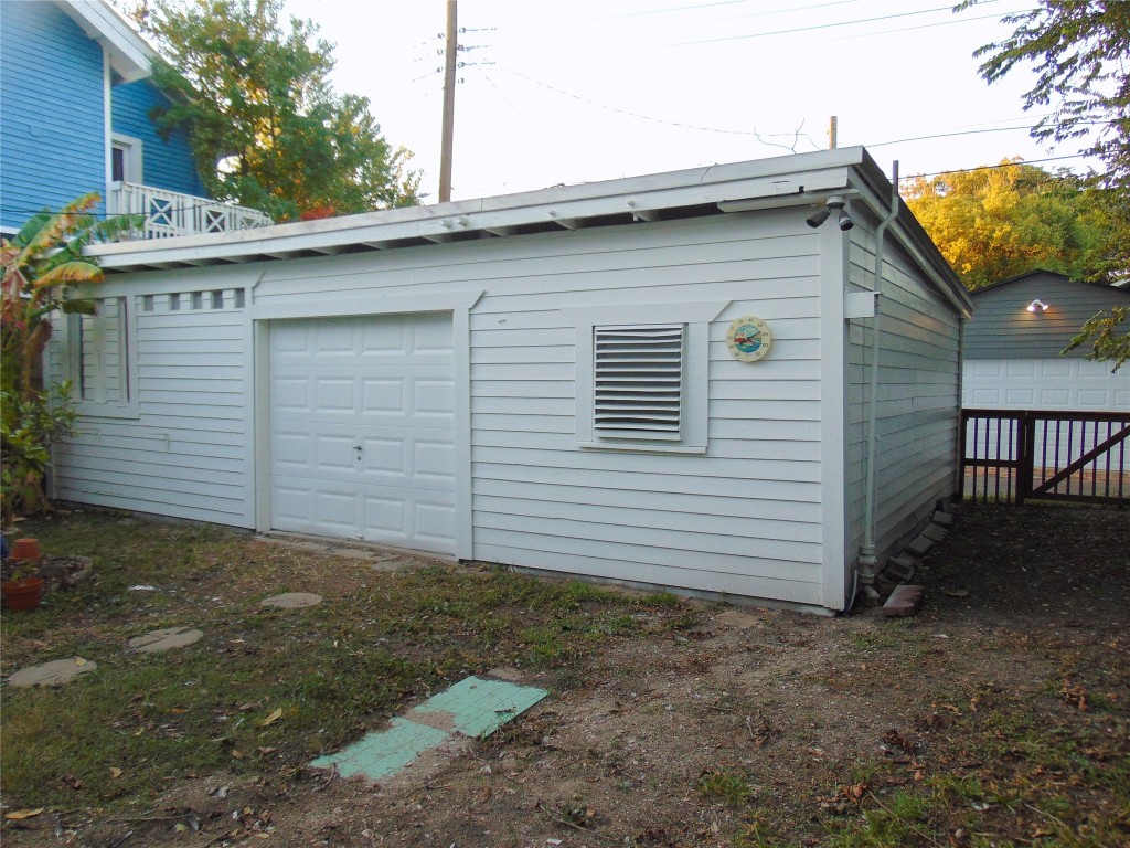 3420 Avenue R Galveston, TX 77550 - Photo 26 of 36 a view of a house with a yard