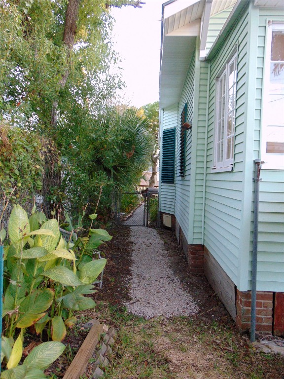 3420 Avenue R Galveston, TX 77550 - Photo 27 of 36 a backyard of a house with lots of green space