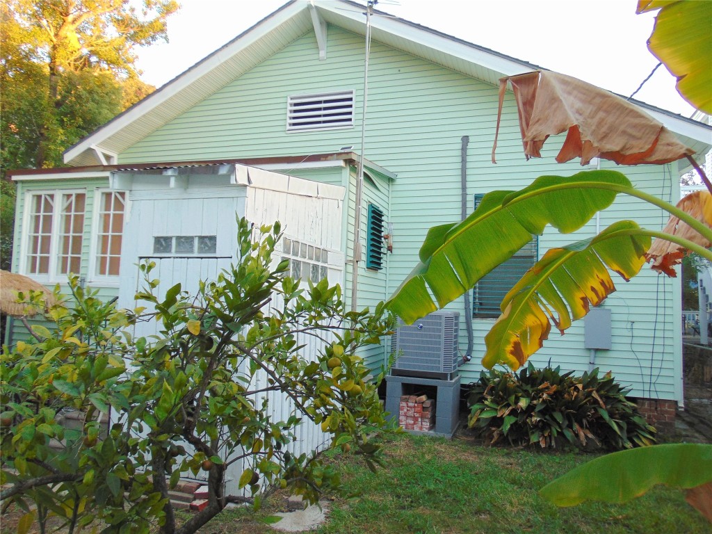 3420 Avenue R Galveston, TX 77550 - Photo 28 of 36 a view of a house with a yard