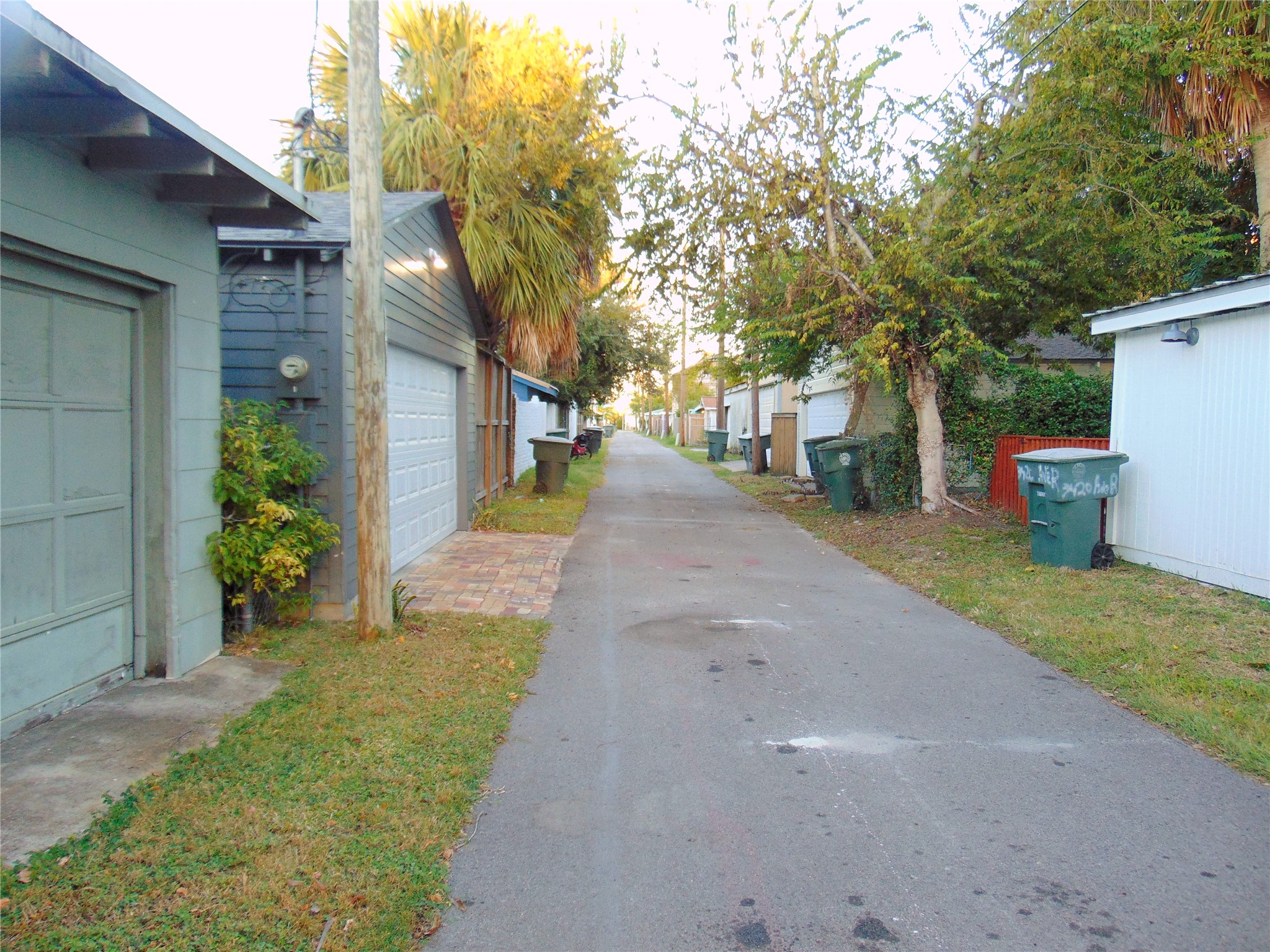 3420 Avenue R Galveston, TX 77550 - Photo 30 of 36 a view of a road with a house in the background