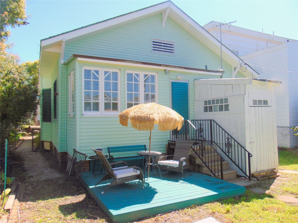 3420 Avenue R Galveston, TX 77550 - Photo 31 of 36 a view of a house with backyard porch and sitting area