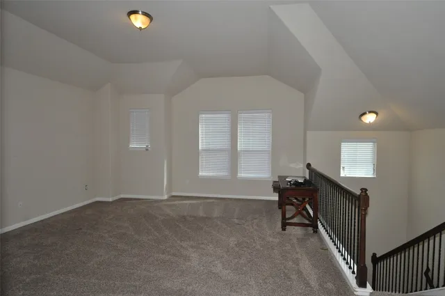 a view of a livingroom with a staircase