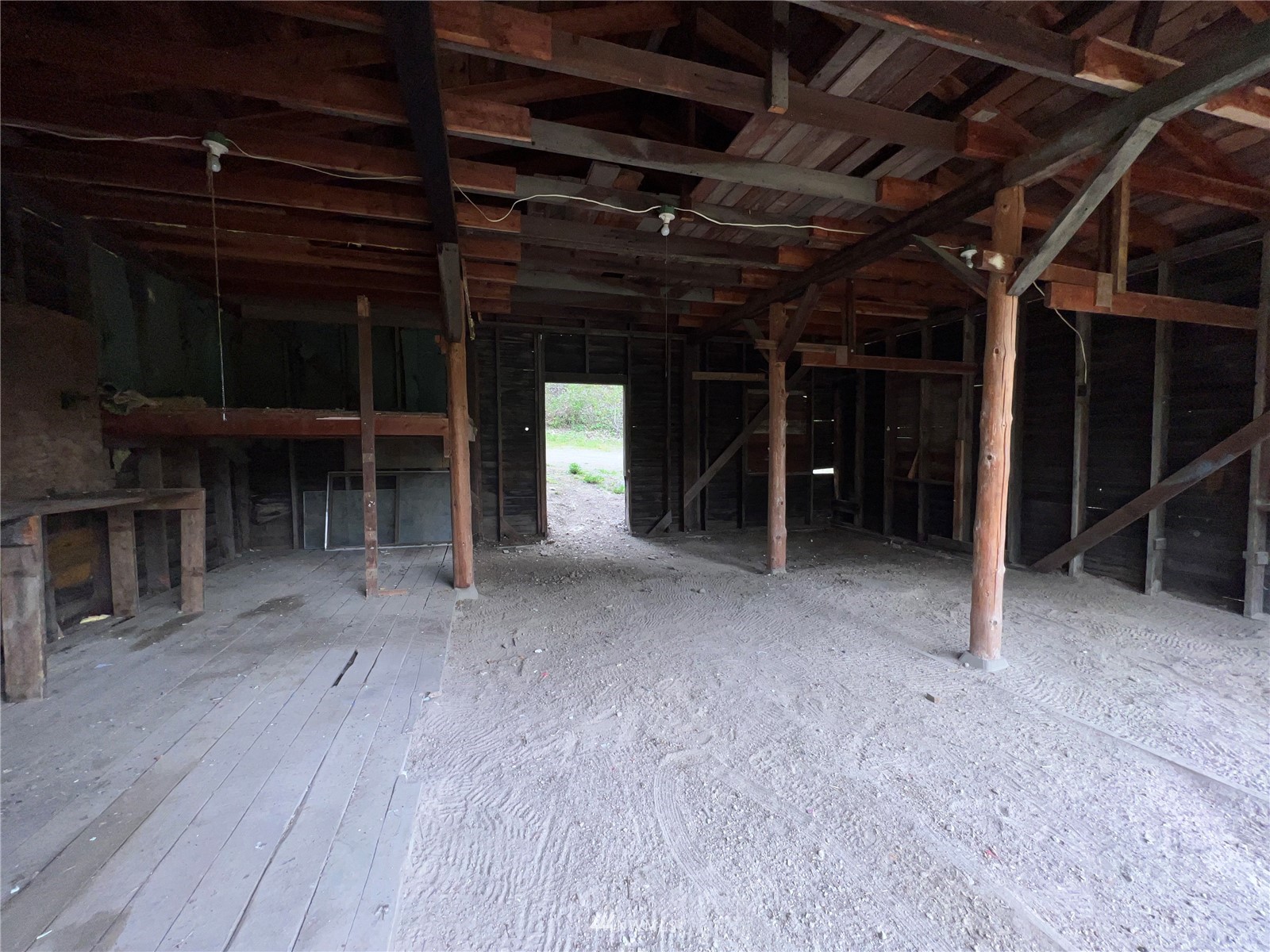 2 Hidden Falls Spur Road Republic, WA 99166 - Photo 17 of 26 a view of an empty room with wooden floor and a sink