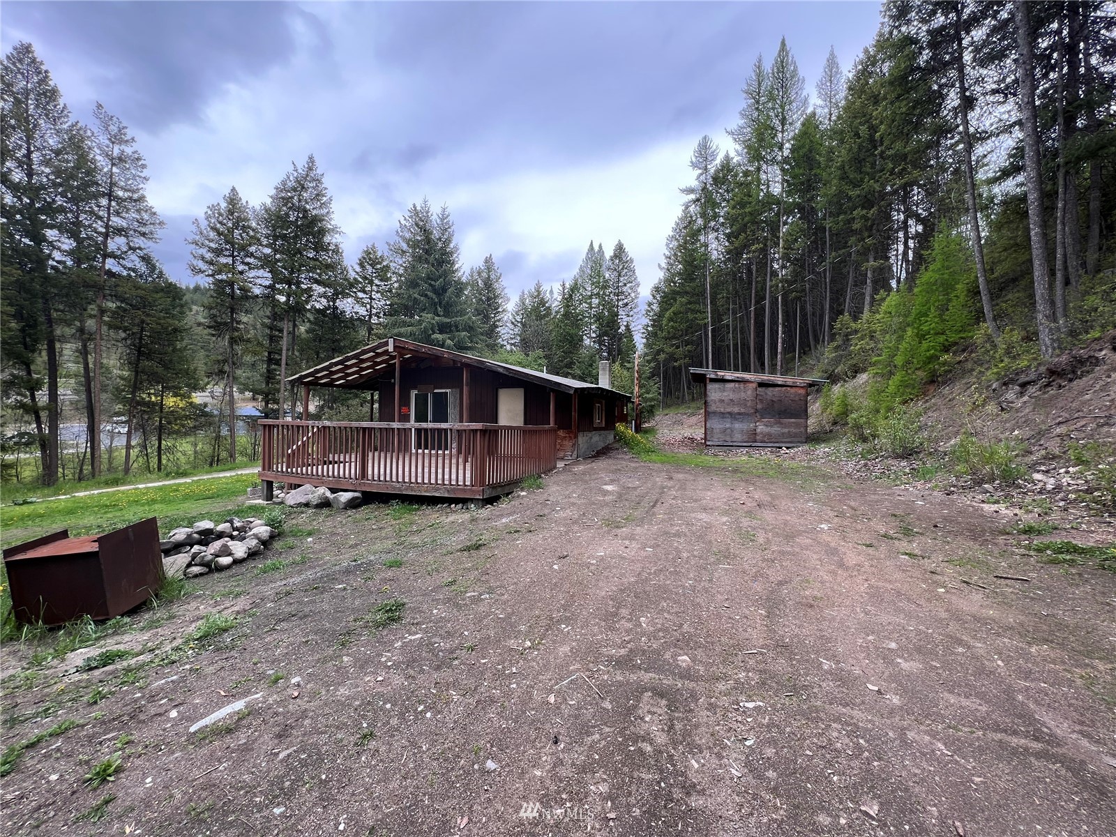 2 Hidden Falls Spur Road Republic, WA 99166 - Photo 18 of 26 a view of backyard with trees and entertaining space