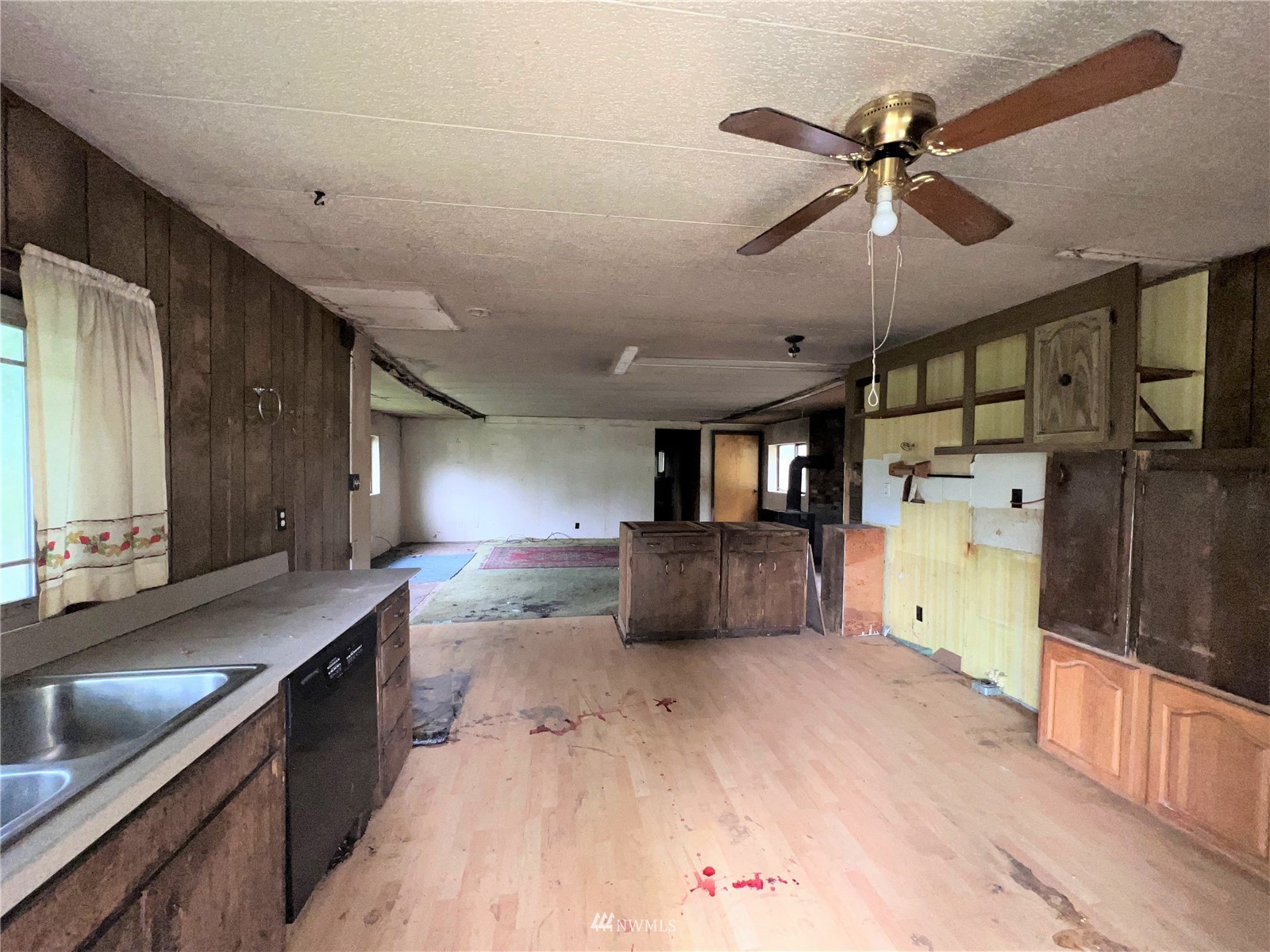2 Hidden Falls Spur Road Republic, WA 99166 - Photo 8 of 26 a view of a kitchen with a sink and a wooden floor