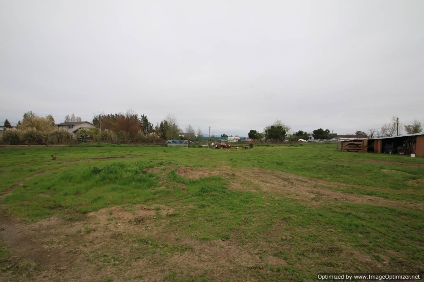 2531 East Gregory Road Central Point, OR 97502 - Photo 12 of 21 a view of a grassy field