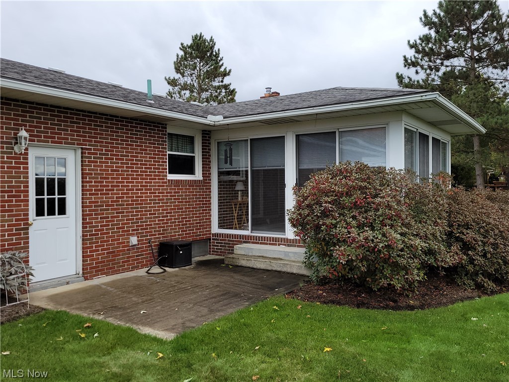 239 Rufener Street Rittman, OH 44270 - Photo 24 of 25 Exterior of Three-Season Room & Patio