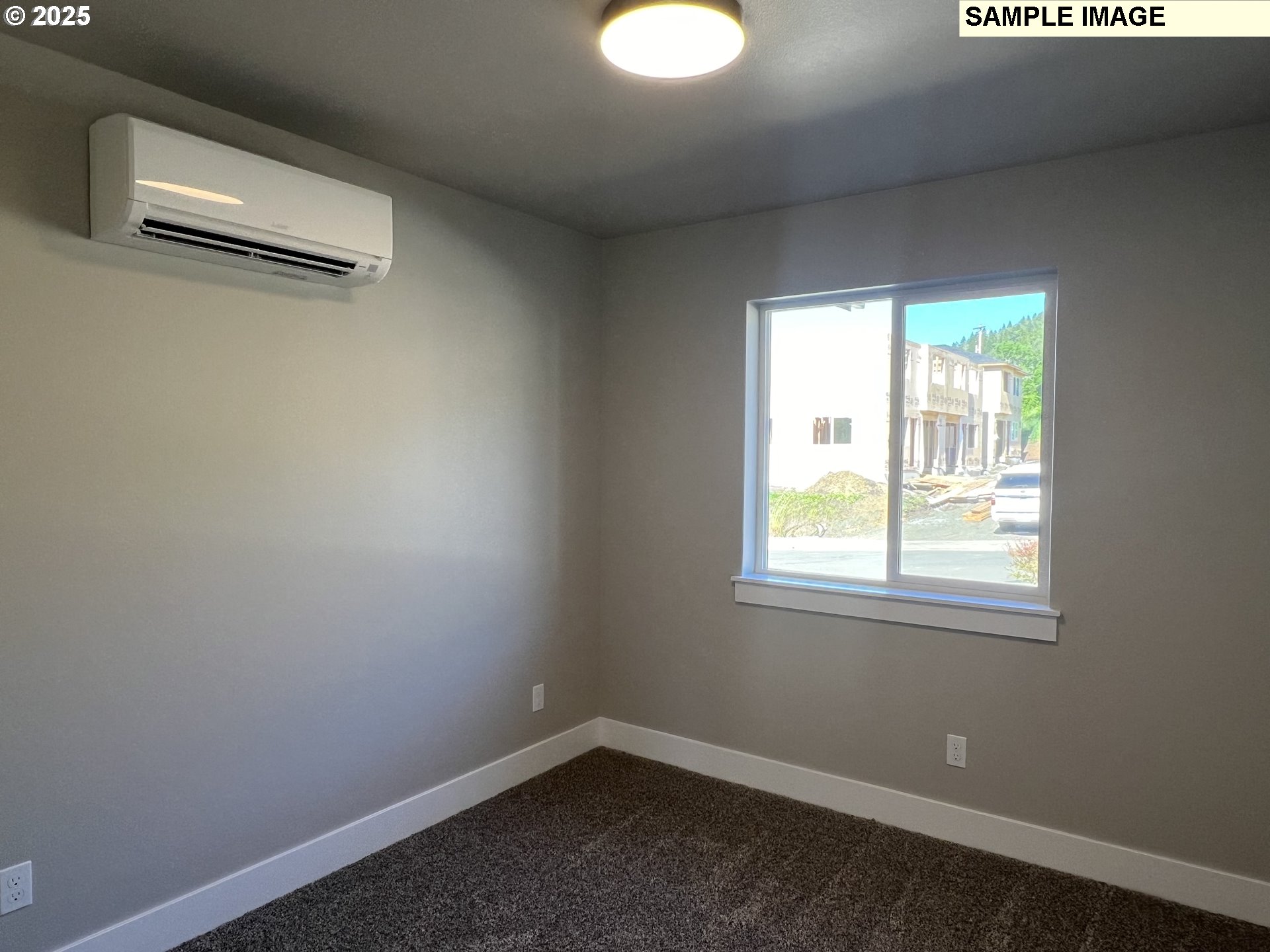 119 Lebleu Lane Winston, OR 97496 - Photo 13 of 30 an empty room with a window