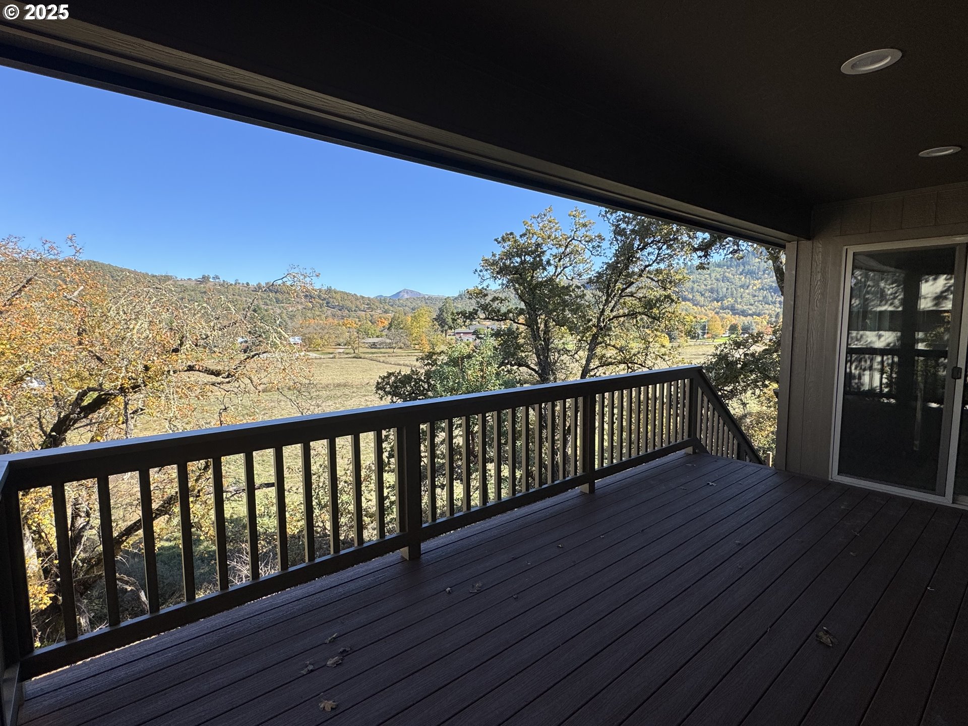 119 Lebleu Lane Winston, OR 97496 - Photo 26 of 30 a view of balcony with wooden floor and mountain view