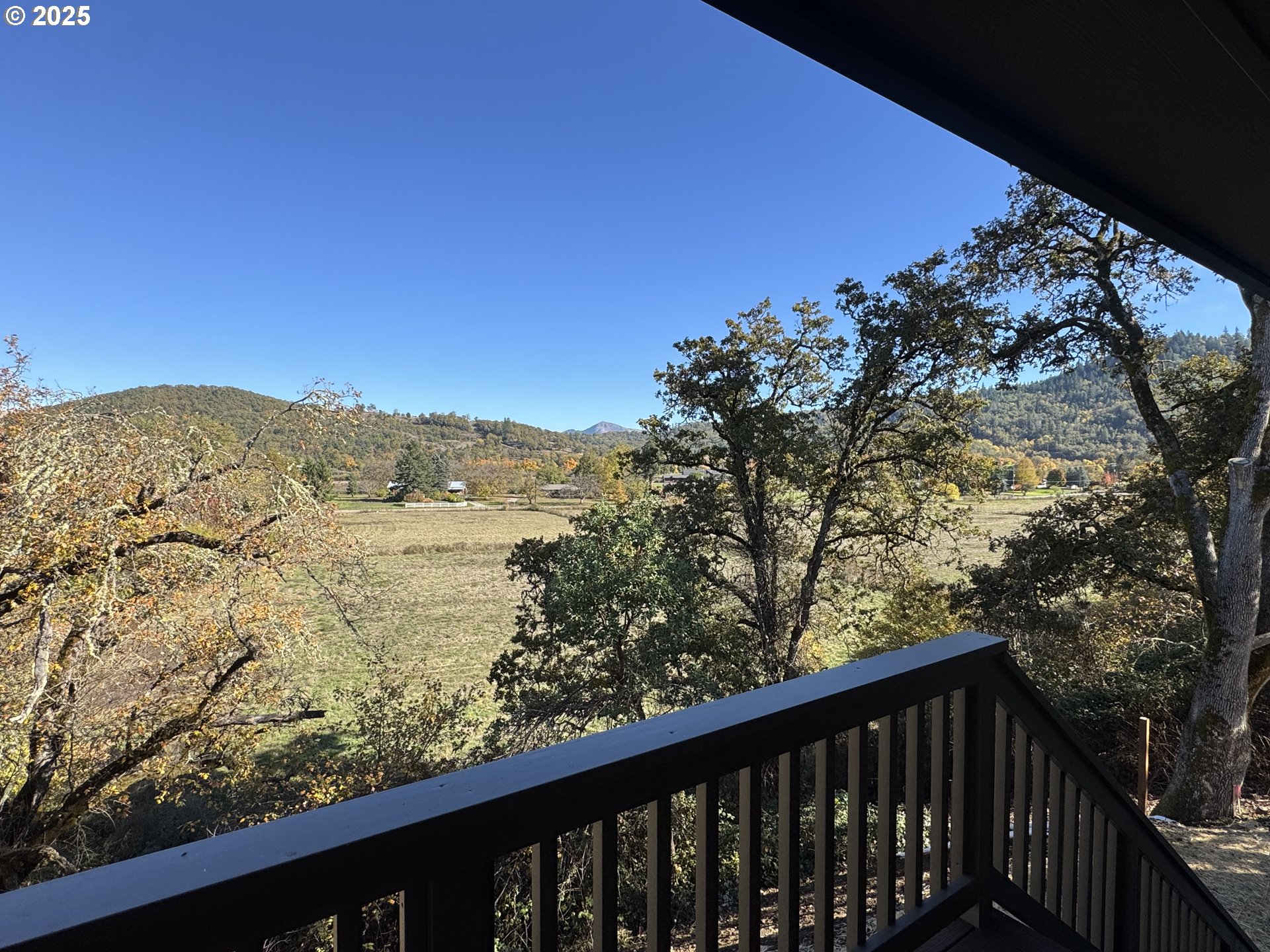 119 Lebleu Lane Winston, OR 97496 - Photo 27 of 30 a view of a forest from a balcony