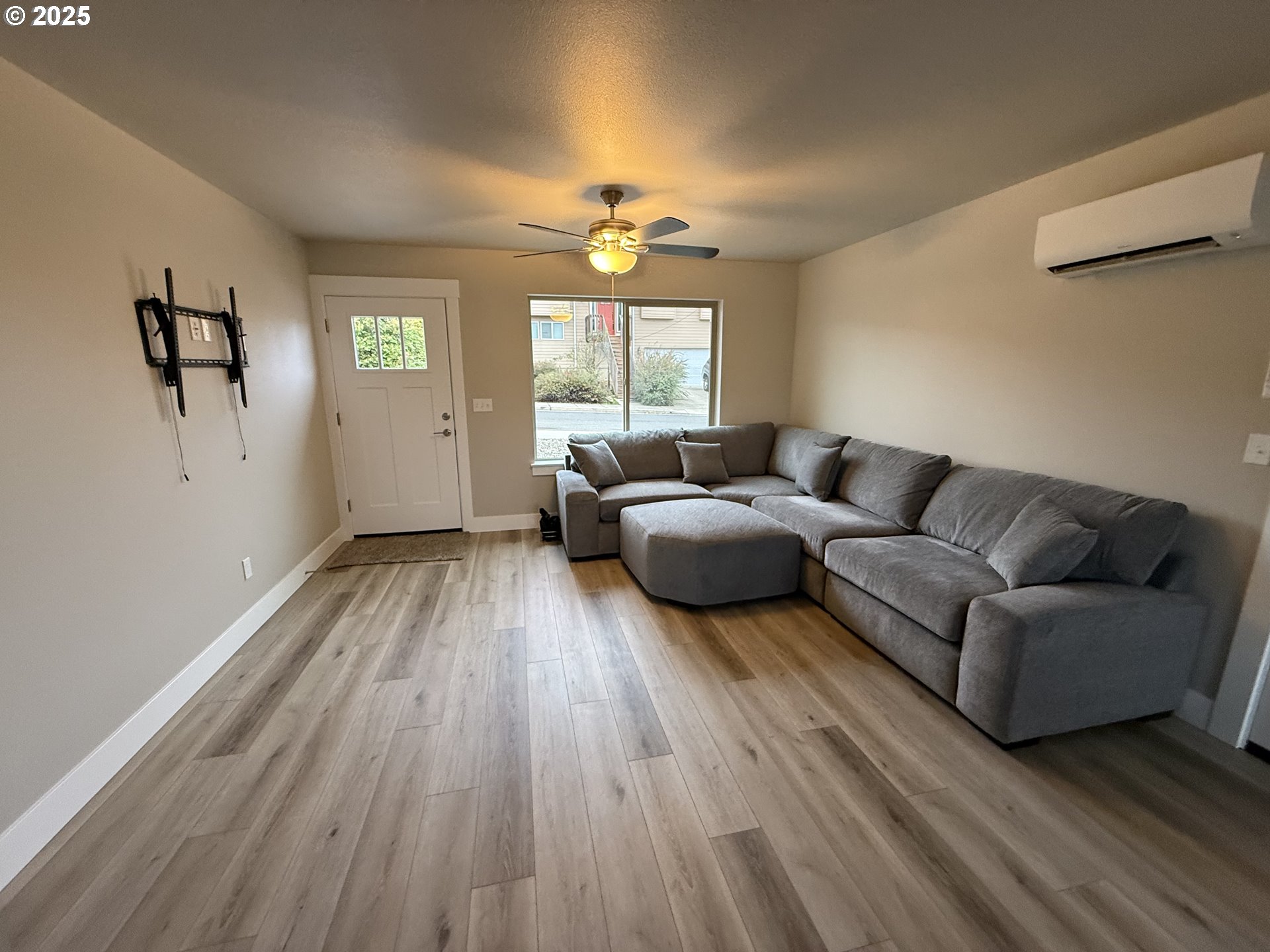 119 Lebleu Lane Winston, OR 97496 - Photo 29 of 30 a living room with furniture and a large window