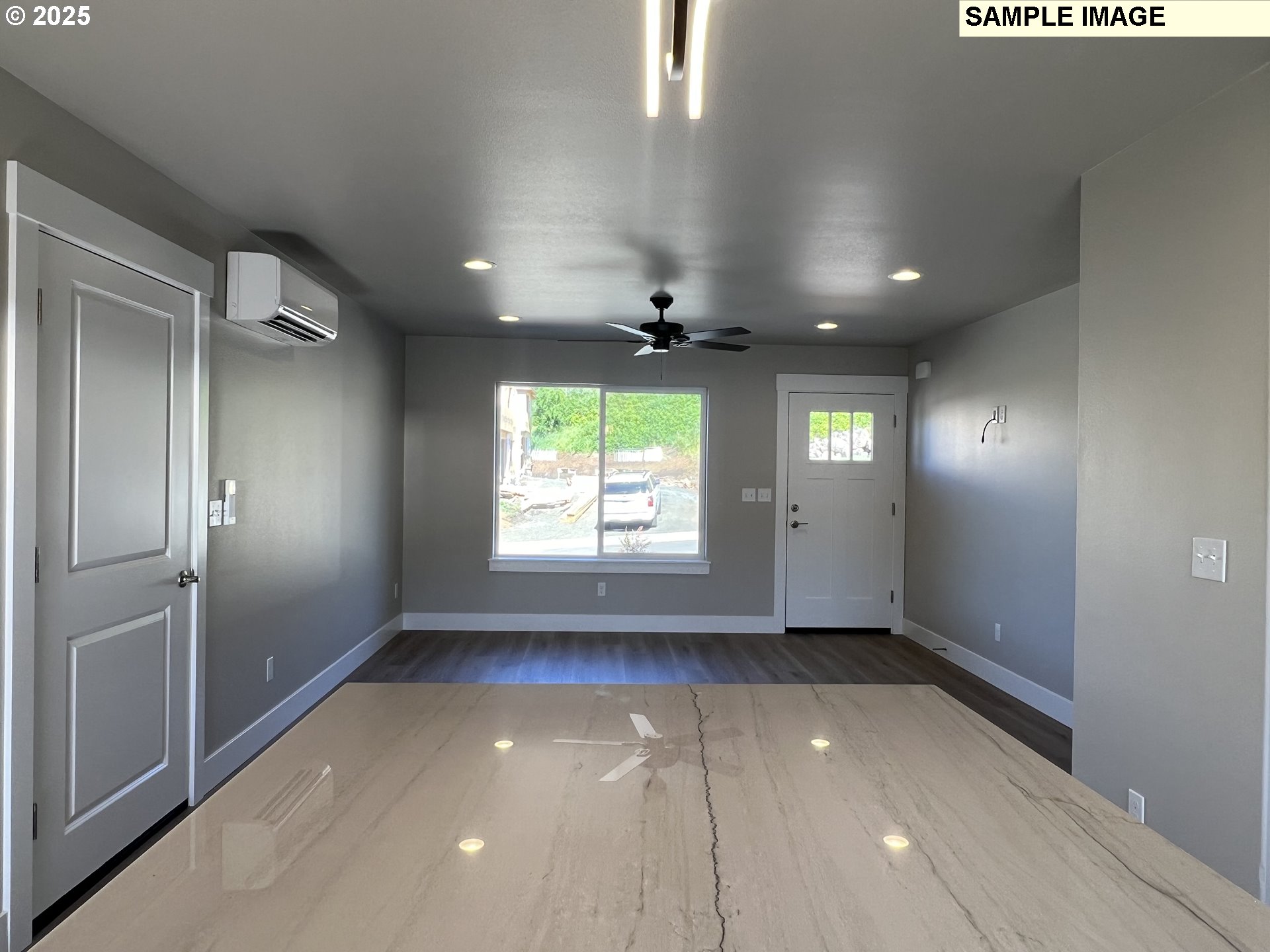 119 Lebleu Lane Winston, OR 97496 - Photo 7 of 30 an empty room with windows and entrance