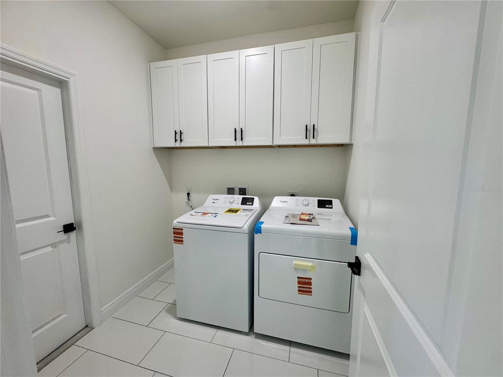 12970 Southwest 43rd Ave Road Ocala, FL 34473 - Photo 14 of 44 a utility room with dryer and washer