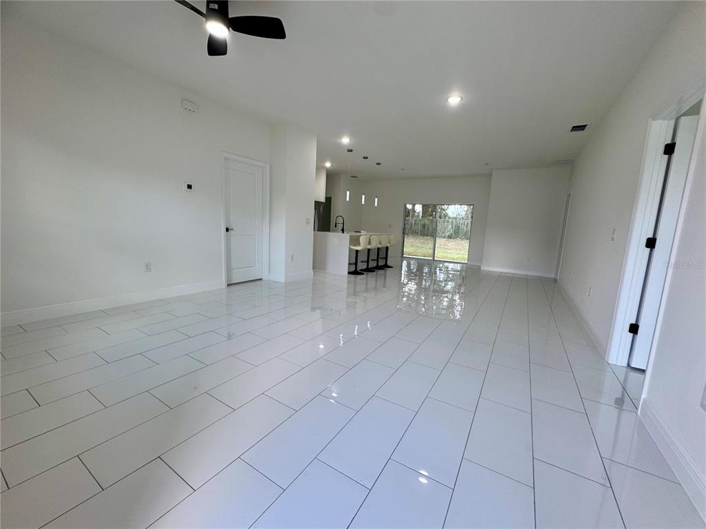 12970 Southwest 43rd Ave Road Ocala, FL 34473 - Photo 15 of 44 an entryway of a room and chandelier fan