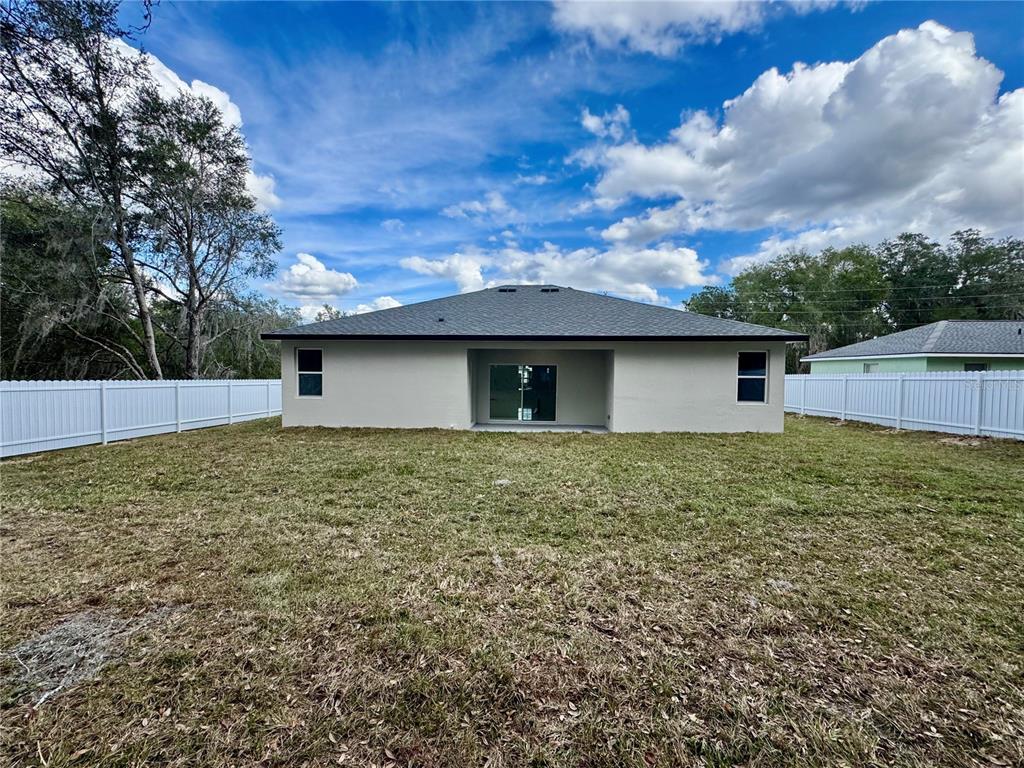 12970 Southwest 43rd Ave Road Ocala, FL 34473 - Photo 25 of 44 a backyard of a house