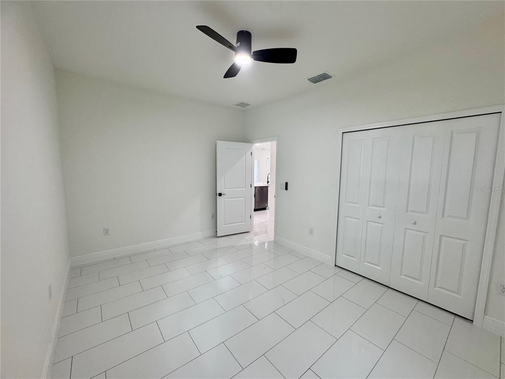 12970 Southwest 43rd Ave Road Ocala, FL 34473 - Photo 29 of 44 wooden floor in an empty room