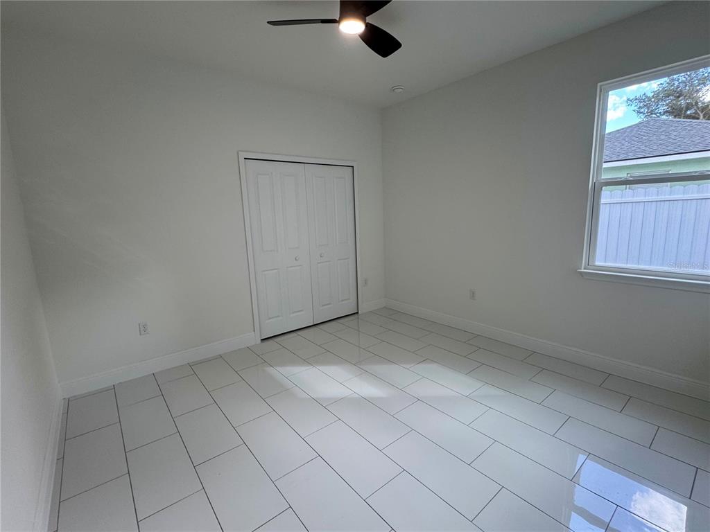 12970 Southwest 43rd Ave Road Ocala, FL 34473 - Photo 35 of 44 an empty room with windows