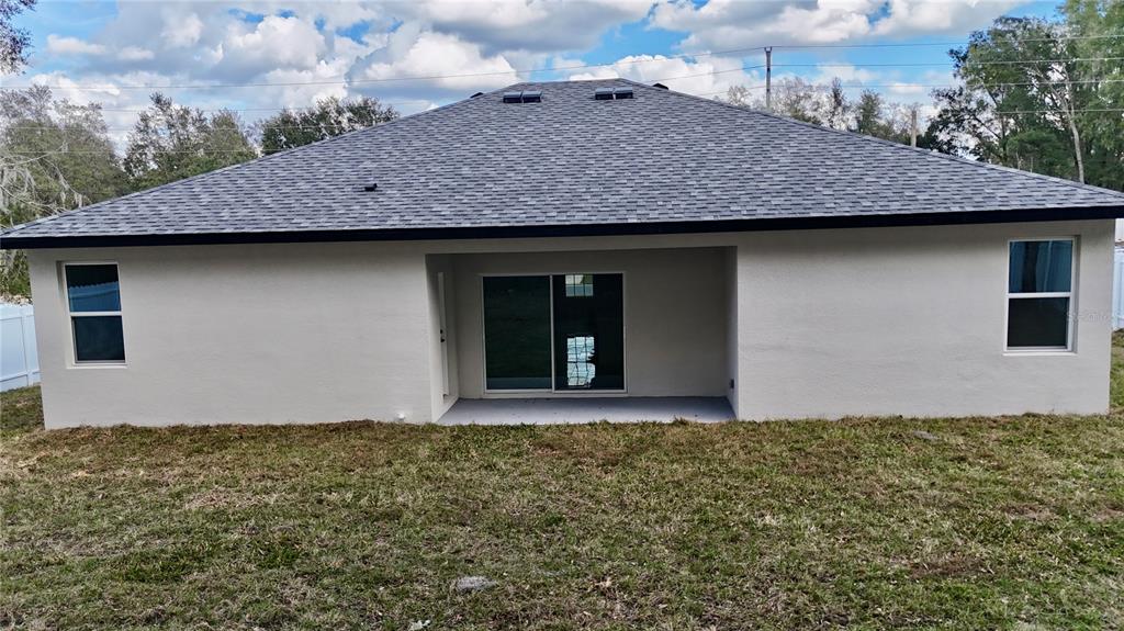 12970 Southwest 43rd Ave Road Ocala, FL 34473 - Photo 4 of 44 a front view of house with yard
