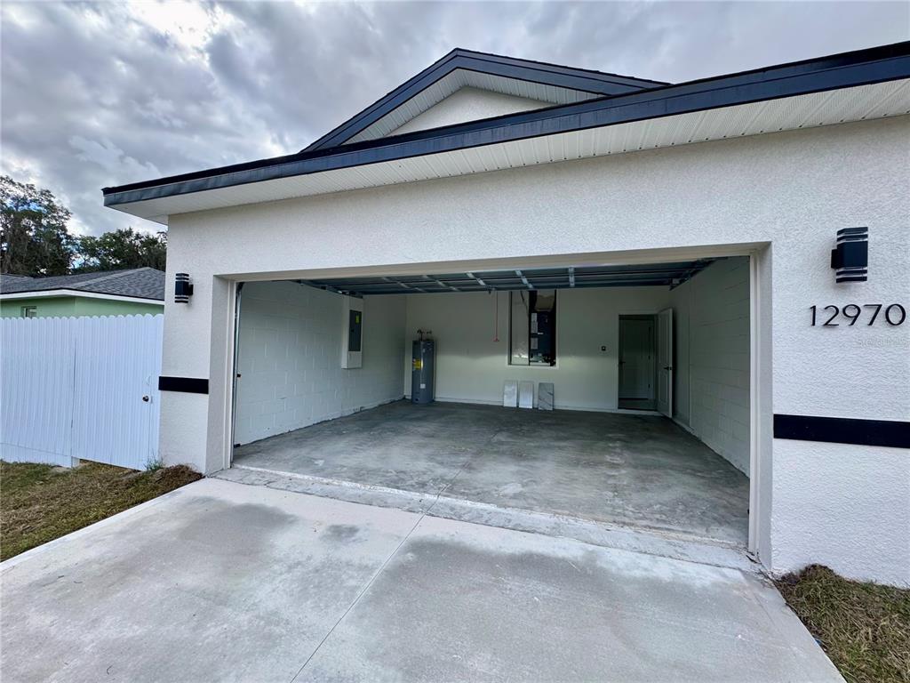 12970 Southwest 43rd Ave Road Ocala, FL 34473 - Photo 44 of 44 a view of a house with a garage