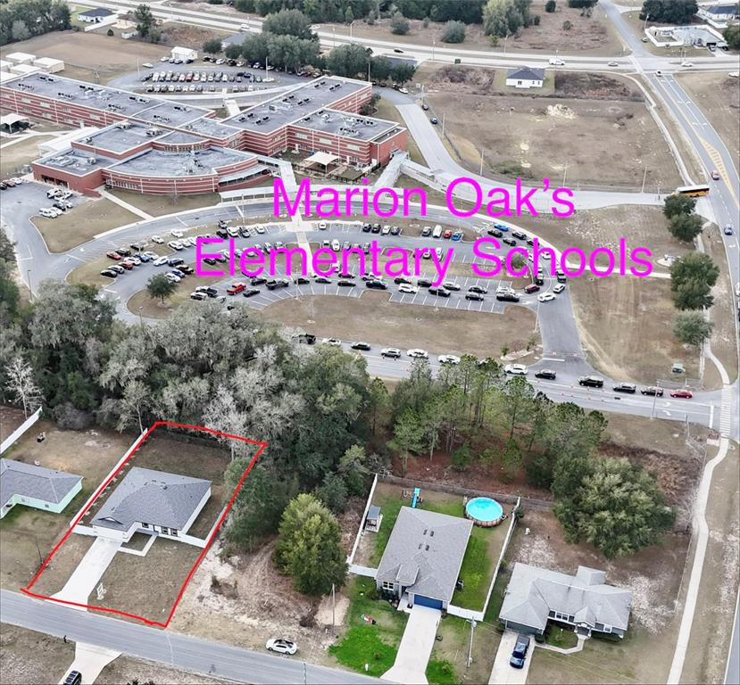 12970 Southwest 43rd Ave Road Ocala, FL 34473 - Photo 6 of 44 an aerial view of residential houses with outdoor space