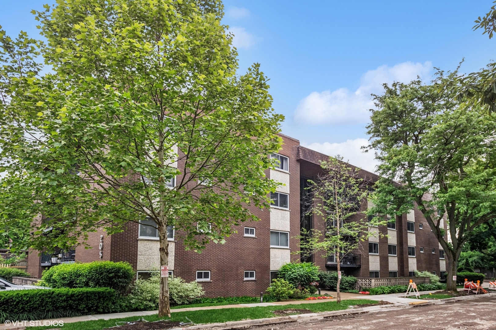 a view of a building and trees