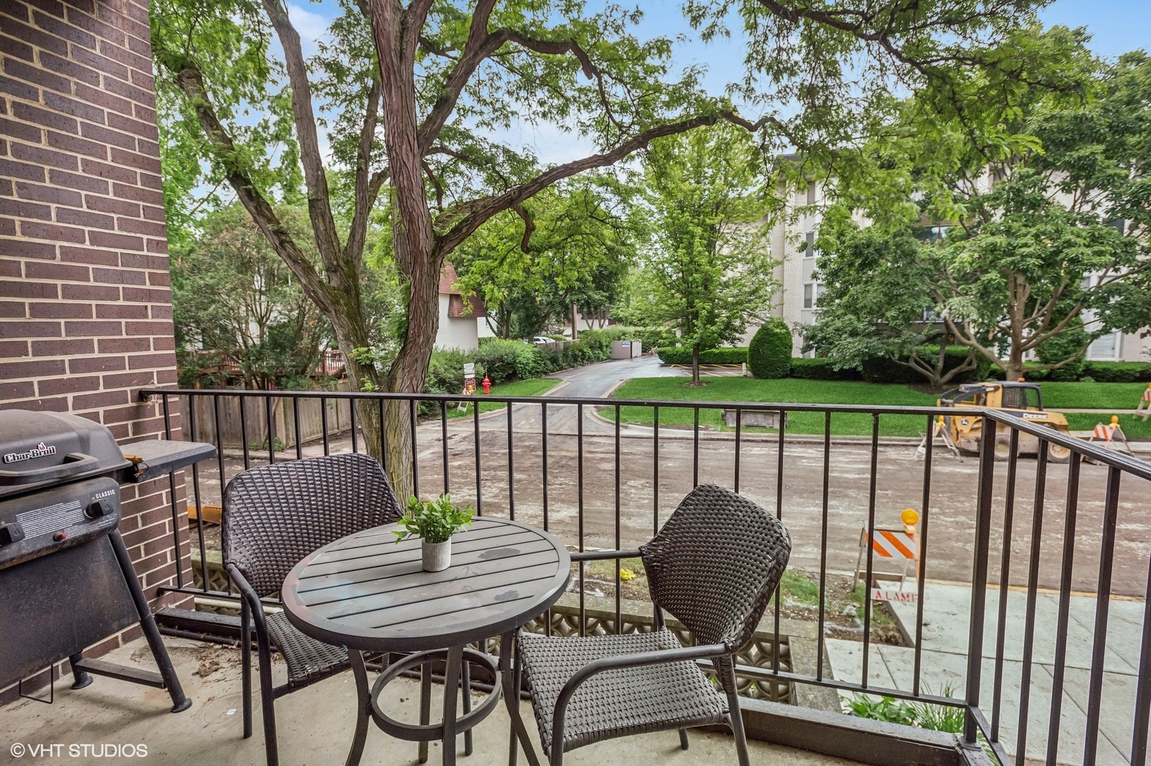 205 Ridge Road, Unit 204 Wilmette, IL 60091 - Photo 15 of 16 a view of a chairs and table in the balcony