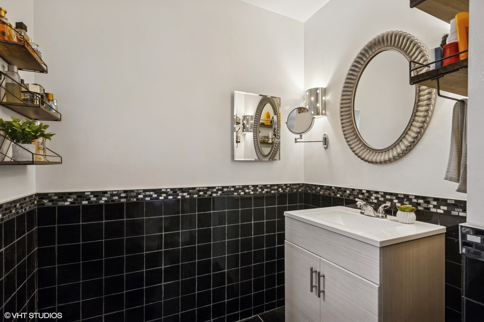 205 Ridge Road, Unit 204 Wilmette, IL 60091 - Photo 10 of 16 a bathroom with a sink and a mirror