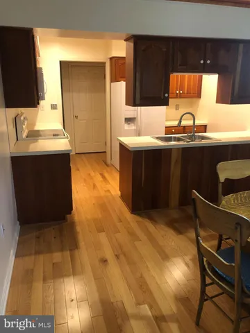 a room with a table and chairs