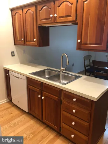 a kitchen with a sink and a stove