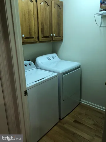 a view of a workspace with furniture