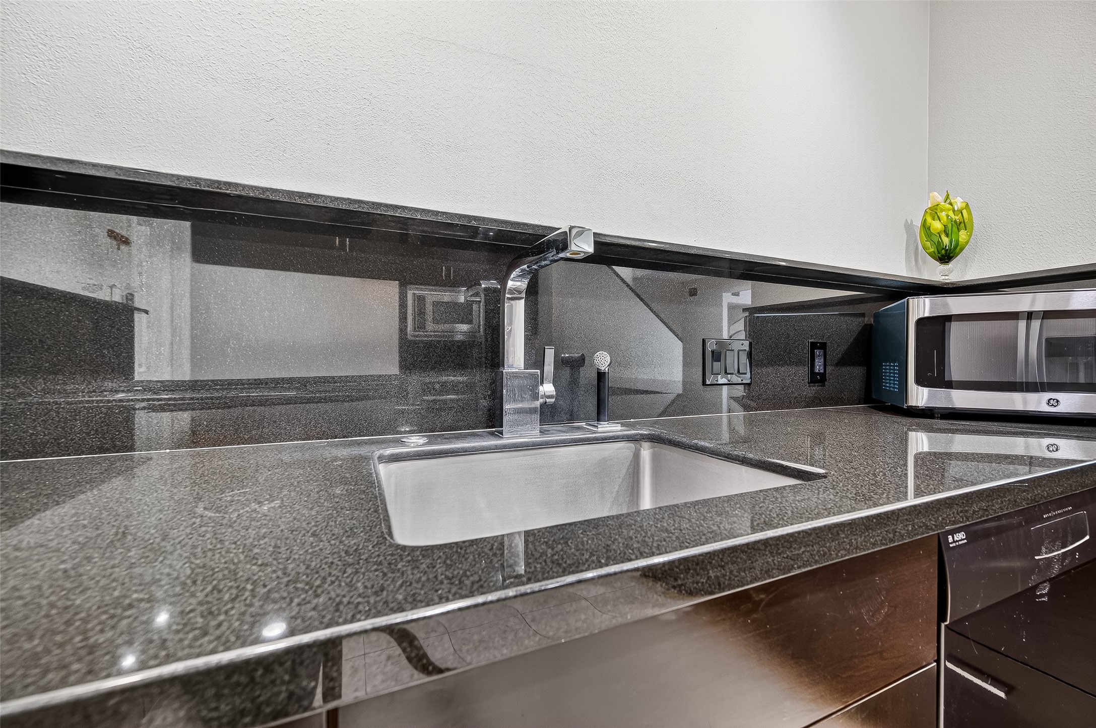 3027 Bissonnet Street Houston, TX 77005 - Photo 21 of 47 Granite island with undermount sink — the centerpiece of a kitchen built for real use