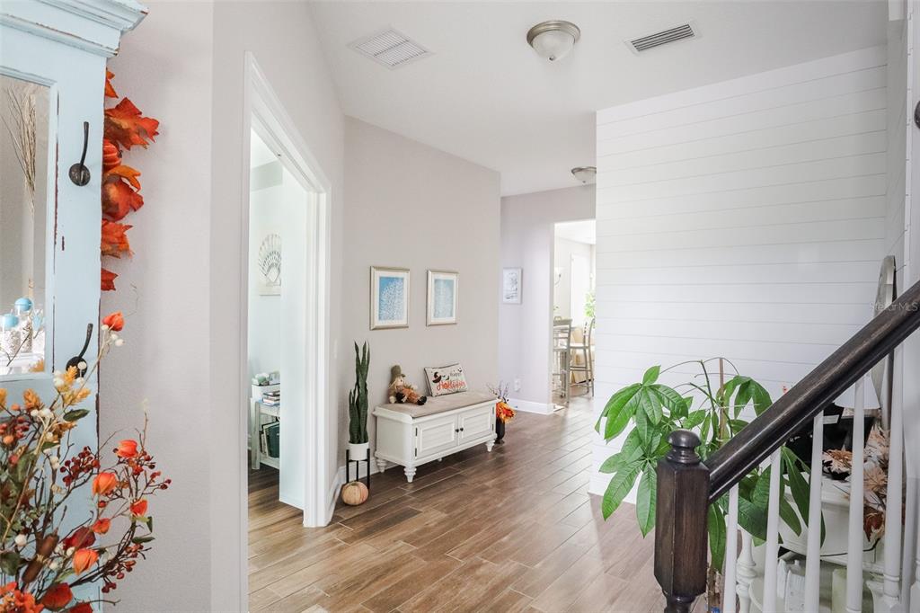 12556 Rangeland Boulevard Odessa, FL 33556 - Photo 12 of 27 a living room with furniture and flowers