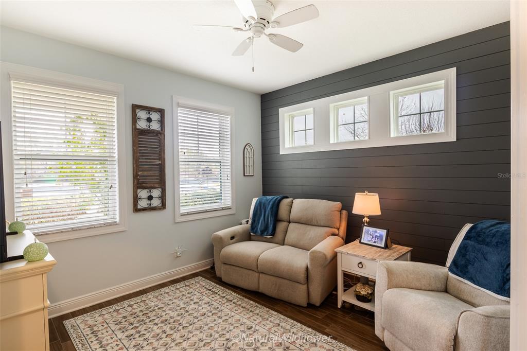 12556 Rangeland Boulevard Odessa, FL 33556 - Photo 14 of 29 a living room with furniture and a window