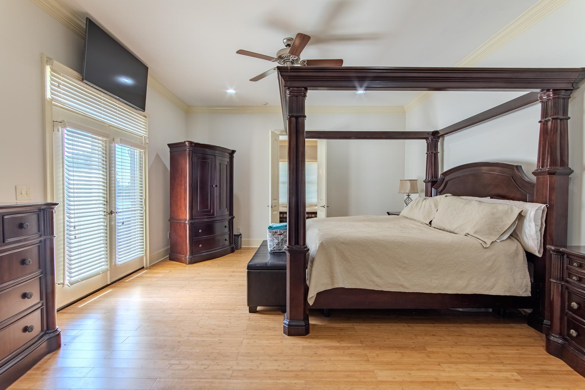 116 Sunset Drive Clifton, TN 38425 - Photo 12 of 40 a bedroom with a bed and a mirror