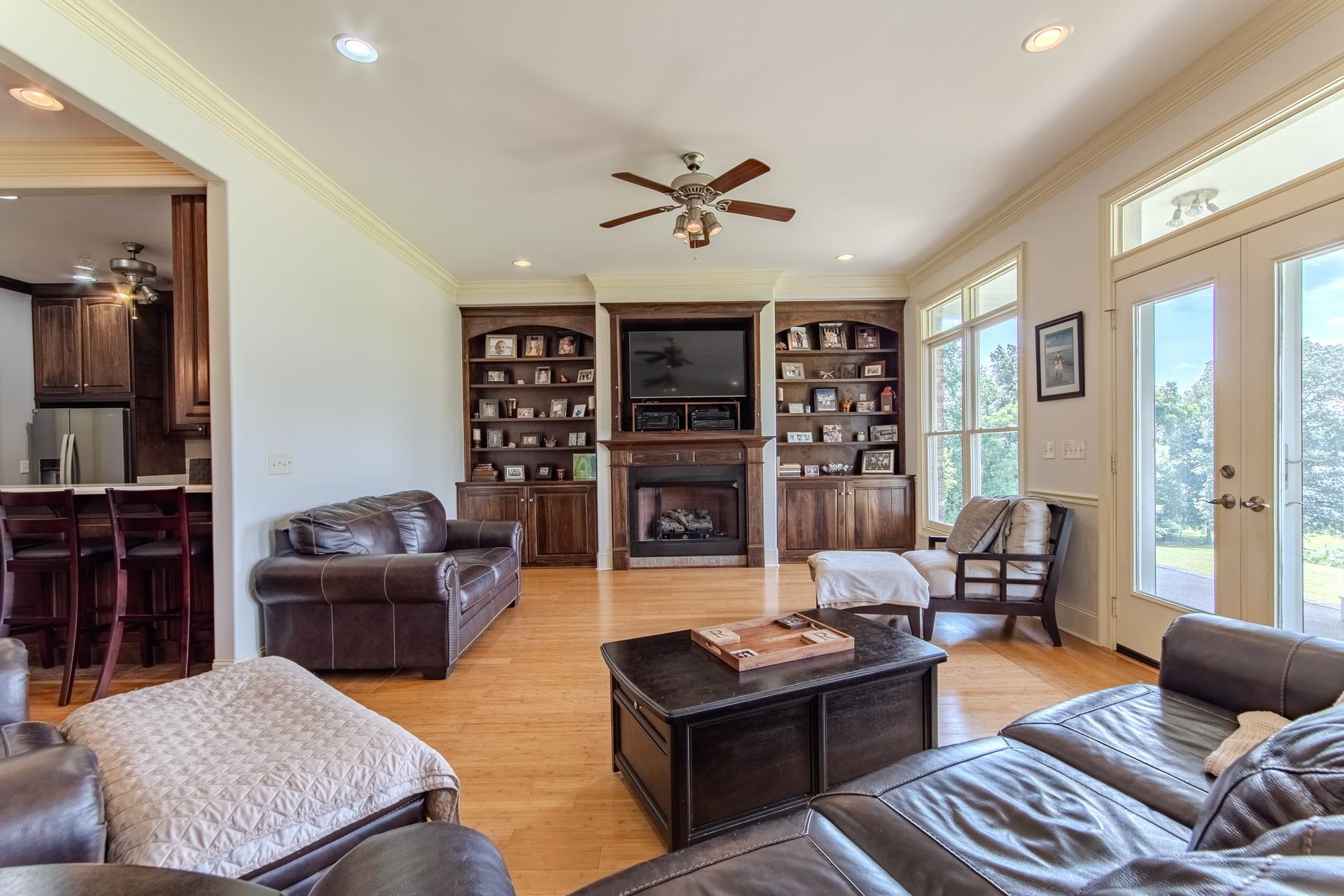 116 Sunset Drive Clifton, TN 38425 - Photo 25 of 40 a living room with furniture fireplace and flat screen tv