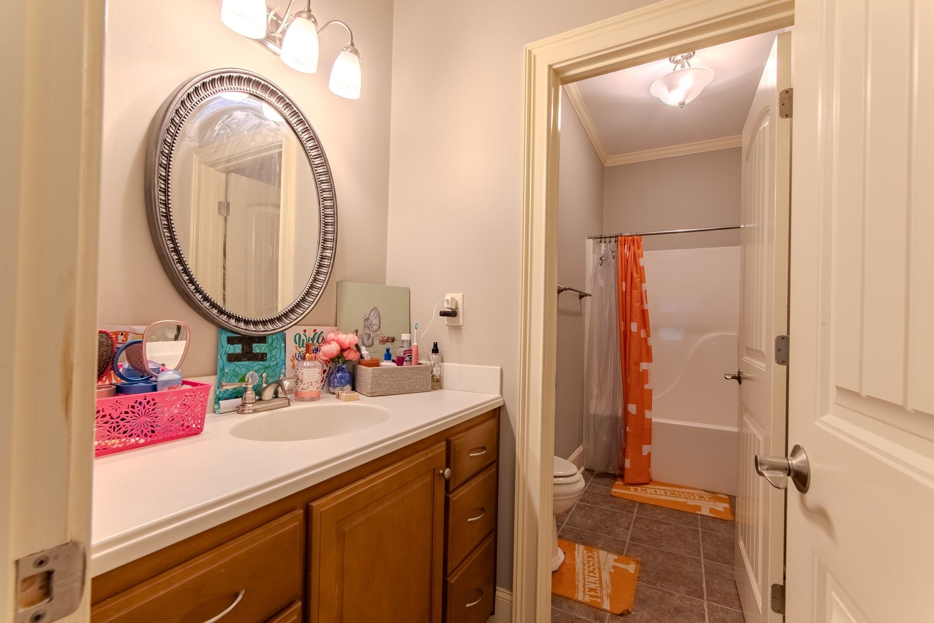 116 Sunset Drive Clifton, TN 38425 - Photo 26 of 40 a bathroom with a sink mirror and a mirror