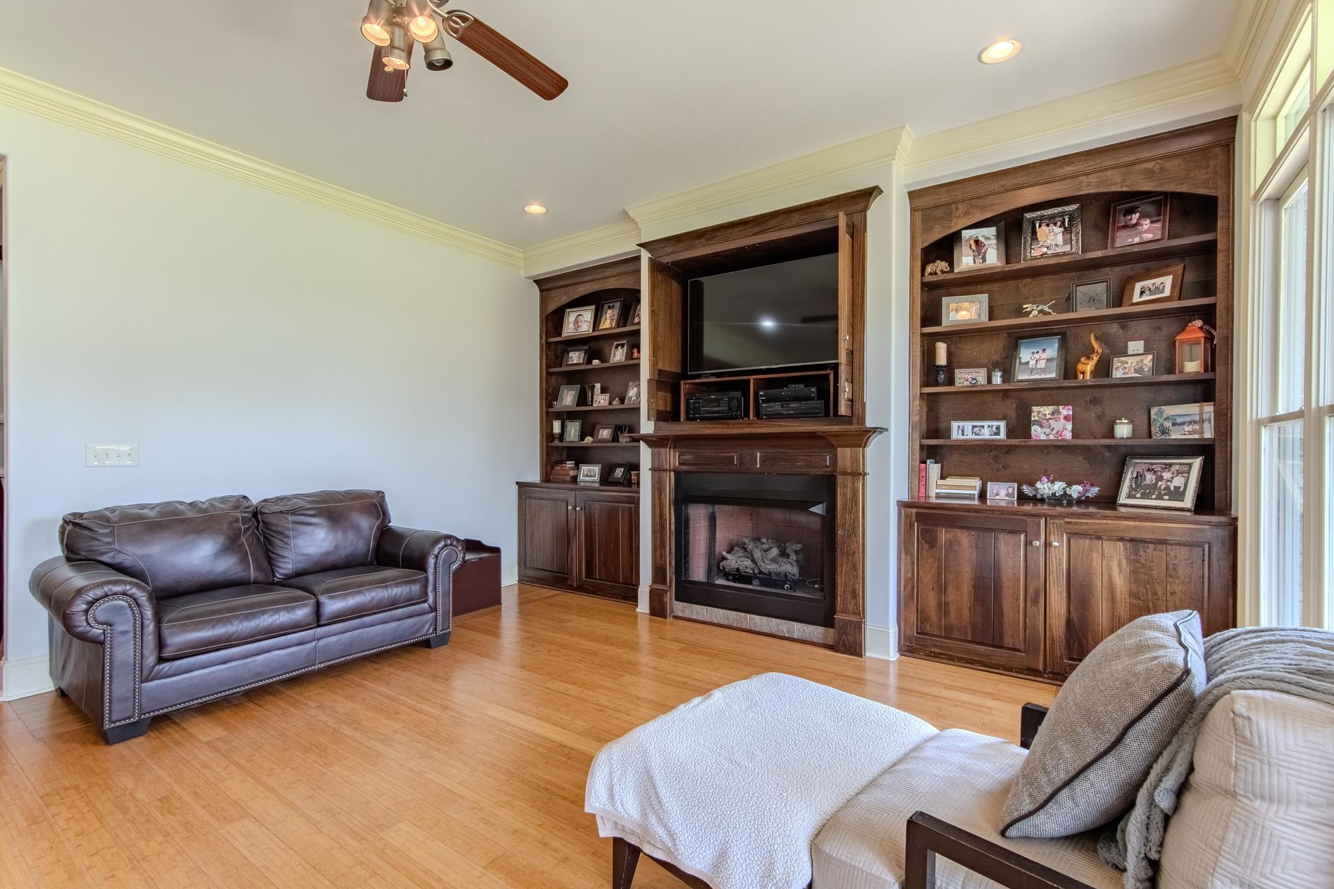 116 Sunset Drive Clifton, TN 38425 - Photo 26 of 40 a living room with furniture and a fireplace