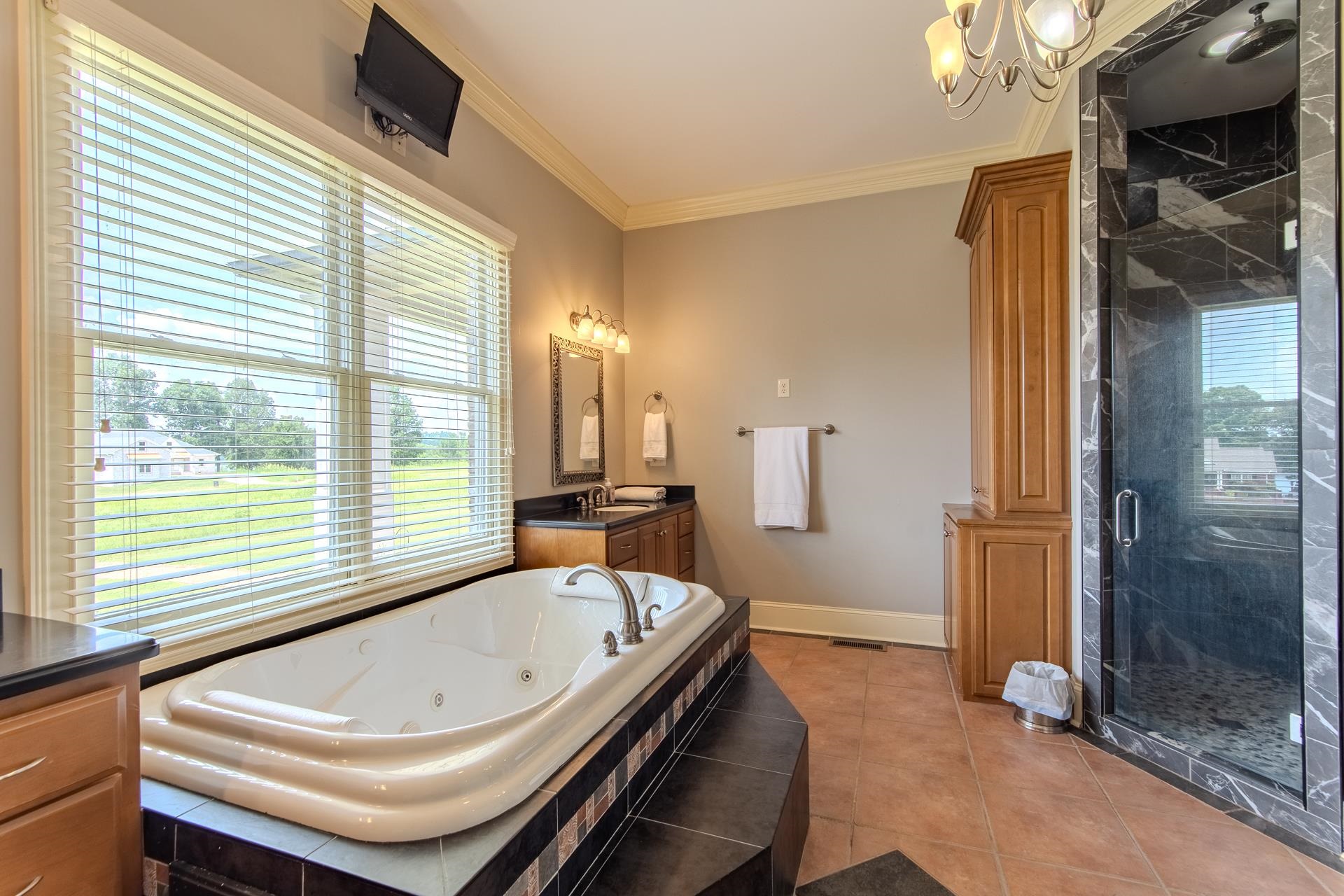 116 Sunset Drive Clifton, TN 38425 - Photo 29 of 40 a bathroom with a bathtub and a shower