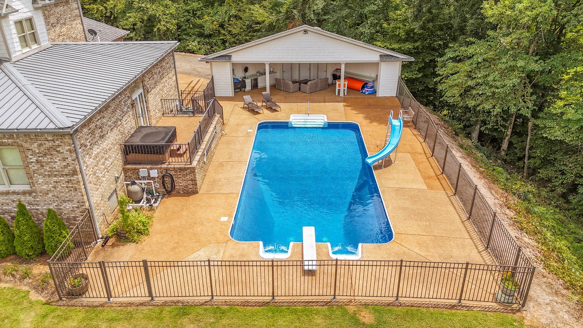 116 Sunset Drive Clifton, TN 38425 - Photo 36 of 40 a aerial view of a house with swimming pool