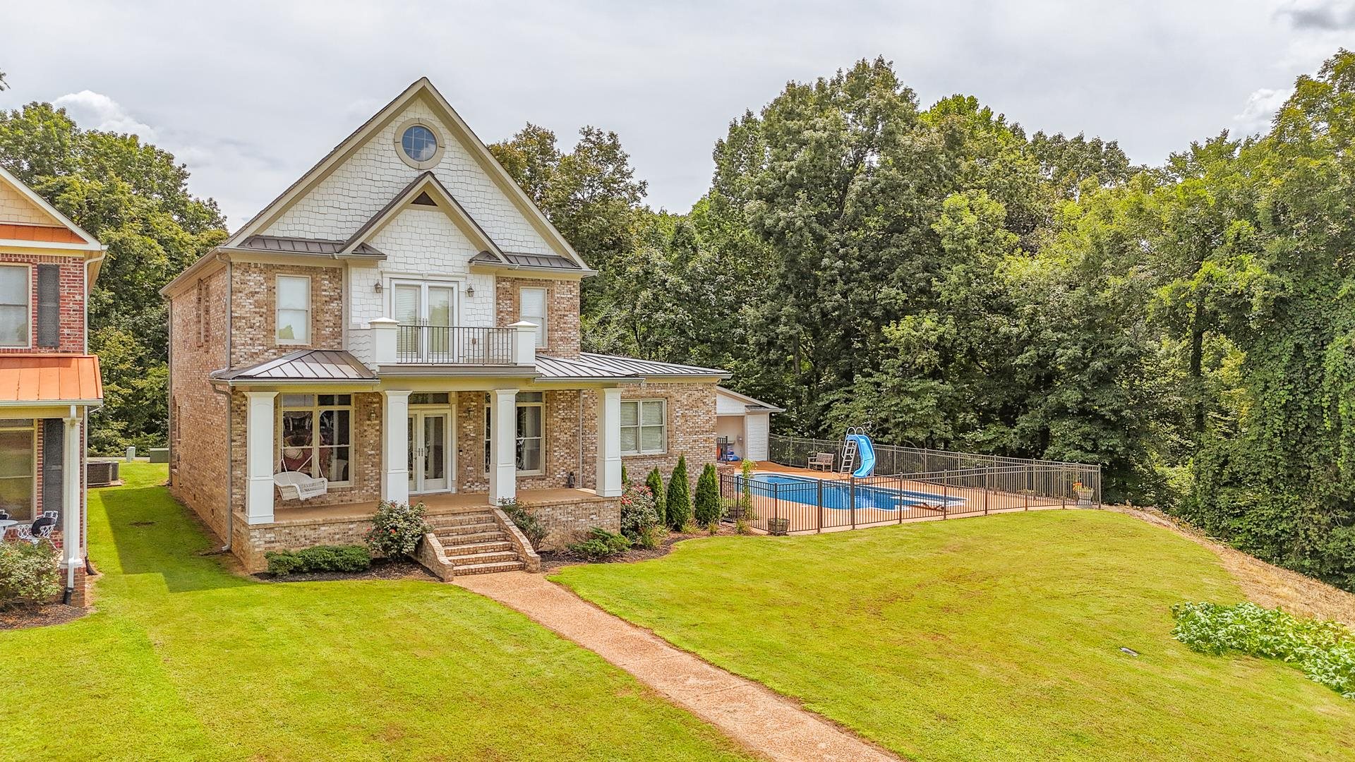 116 Sunset Drive Clifton, TN 38425 - Photo 37 of 40 a view of a house with a swimming pool