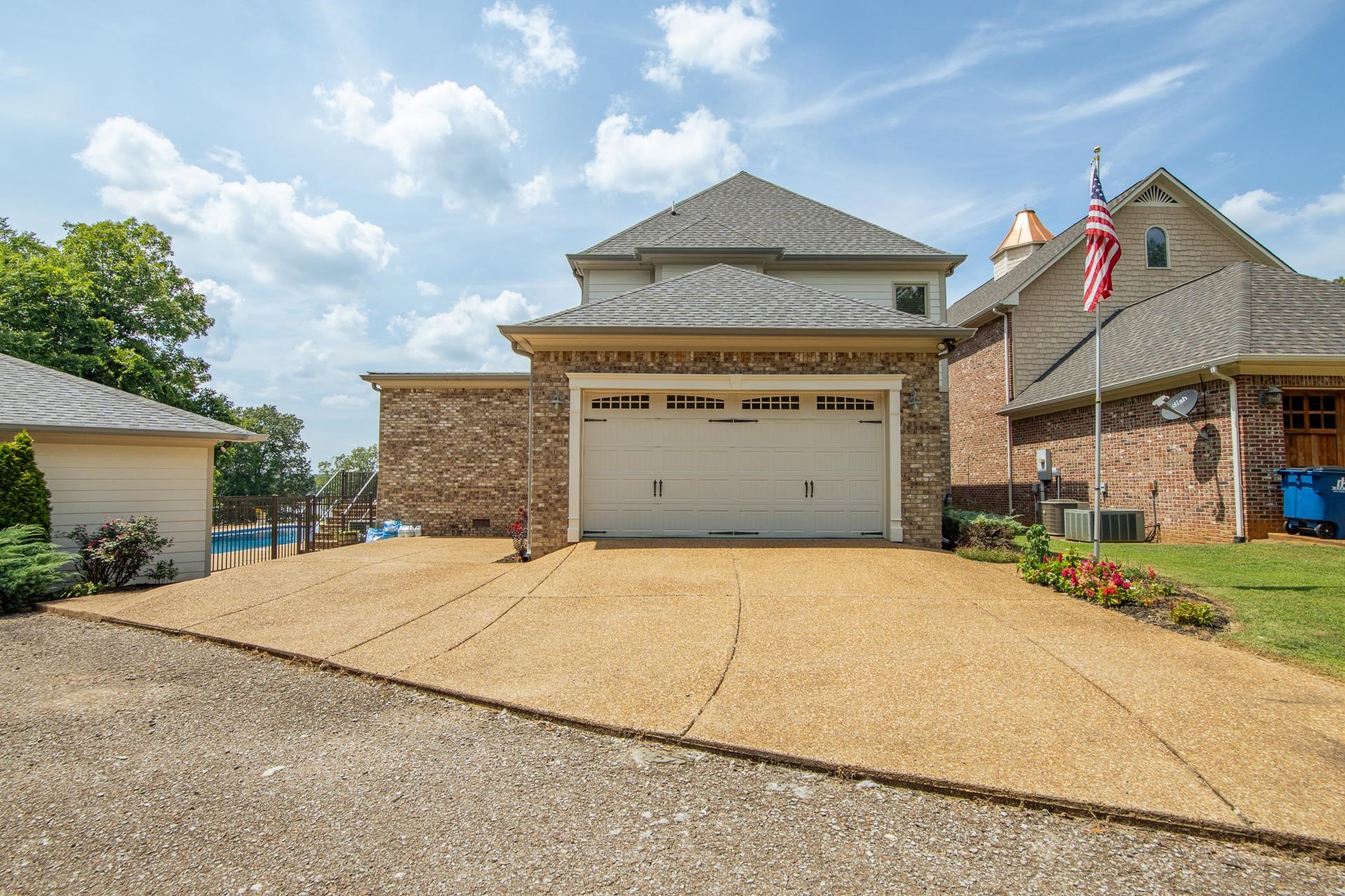 116 Sunset Drive Clifton, TN 38425 - Photo 37 of 40 a front view of a house with a garage