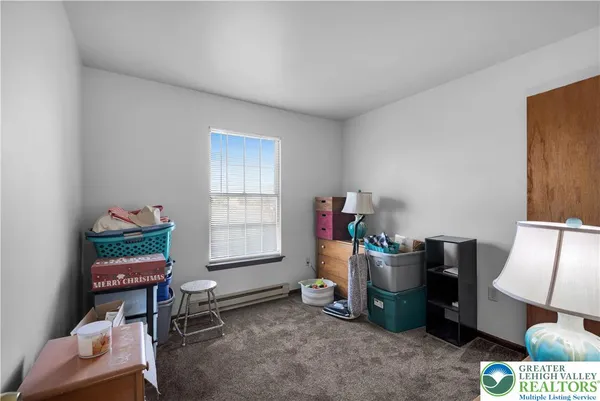 a room with furniture and a window